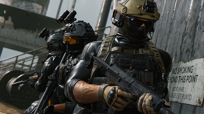 A screenshot from Modern Warfare II showing two soldiers preparing to breach