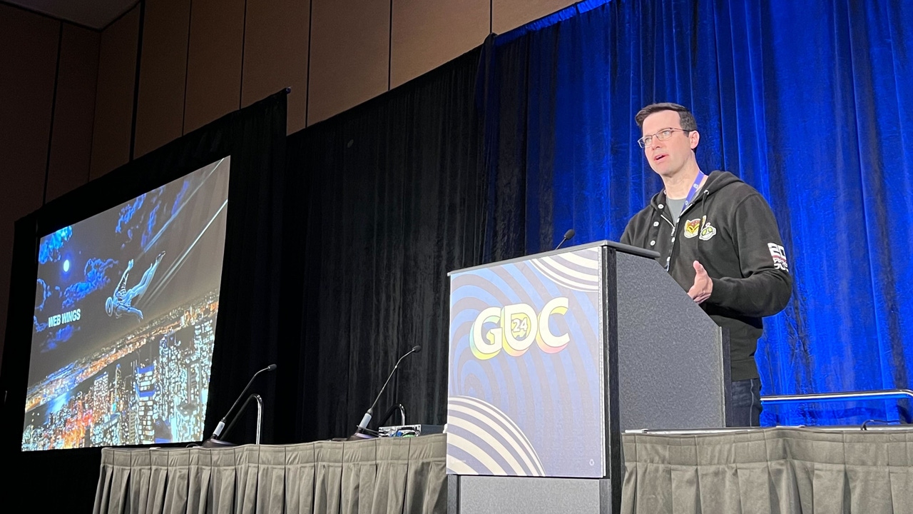 Senior programming director Doug Sheehan at GDC podium Senior programming director Doug Sheehan at GDC podium