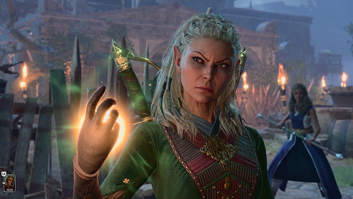 An elf druid raises her hand with a glowing spell.