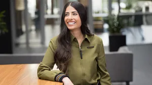 A photograph of Xbox CEO Asha Sharma in a green jacket. A photograph of Xbox CEO Asha Sharma in a green jacket.
