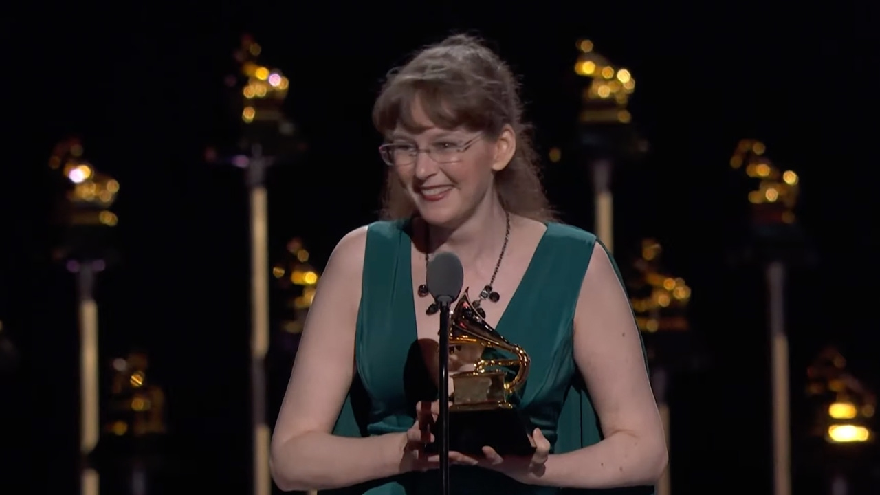 Winifred Phillips collecting her Grammy award on-stage at the 2025 ceremony Winifred Phillips collecting her Grammy award on-stage at the 2025 ceremony