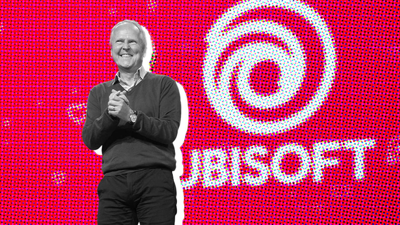 A photograph of Ubisoft boss Yves Guillemot standing on stage that has been edited to enhance colors and contrast A photograph of Ubisoft boss Yves Guillemot standing on stage that has been edited to enhance colors and contrast
