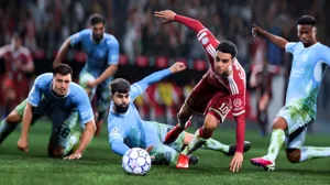 A group of soccer players scramble for the ball. A group of soccer players scramble for the ball.