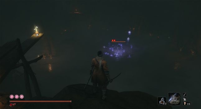 Sekiro; a shinobi stands before a dark pit with a ghostly purple warrior chanting at its center.
