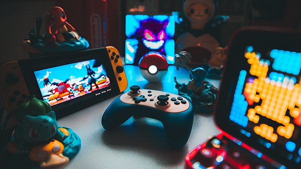 An assembly of Pokemon merchandise and games An assembly of Pokemon merchandise and games