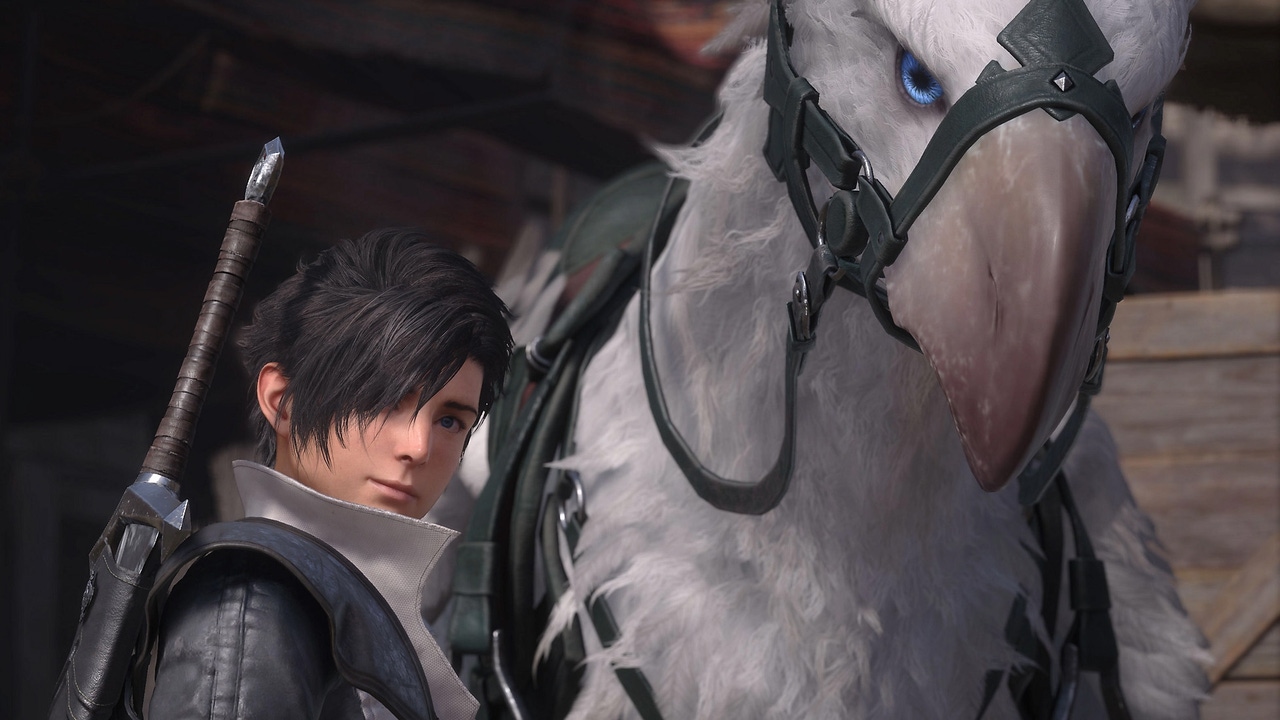 A screenshot from Final Fantasy XVI. A young man stands next to a Chocobo. A screenshot from Final Fantasy XVI. A young man stands next to a Chocobo.