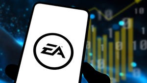 The EA logo on a phone in front of a stock chart. The EA logo on a phone in front of a stock chart.