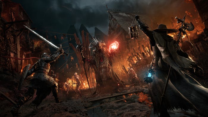 A screenshot from Lords of the Fallen. A sword-wielder and a halberd-wielder attack a demonic creature in a burning medieval city.