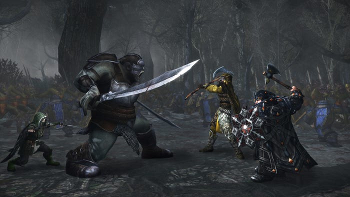 A screenshot from The Lord of the Rings Online. A party fights a massive orc.