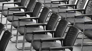 Rows of empty office chairs Rows of empty office chairs