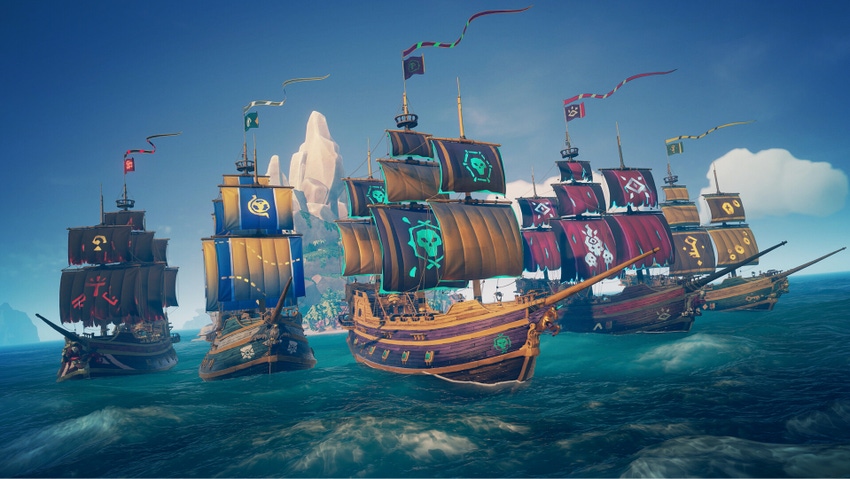 Four tall ships sail the waters in Sea of Thieves.