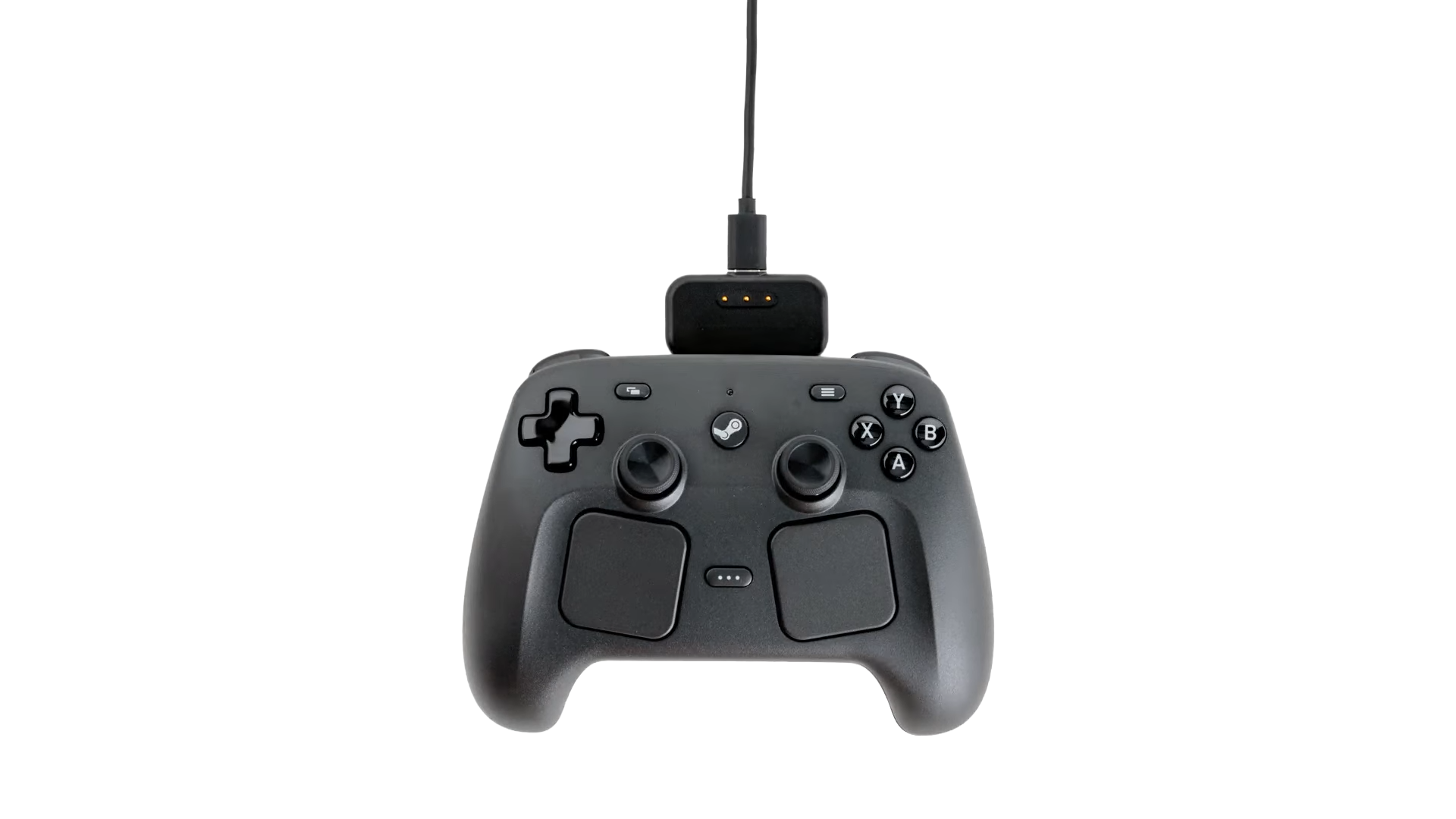 A photograph of the Steam Controller with the new Steam Controller Puck