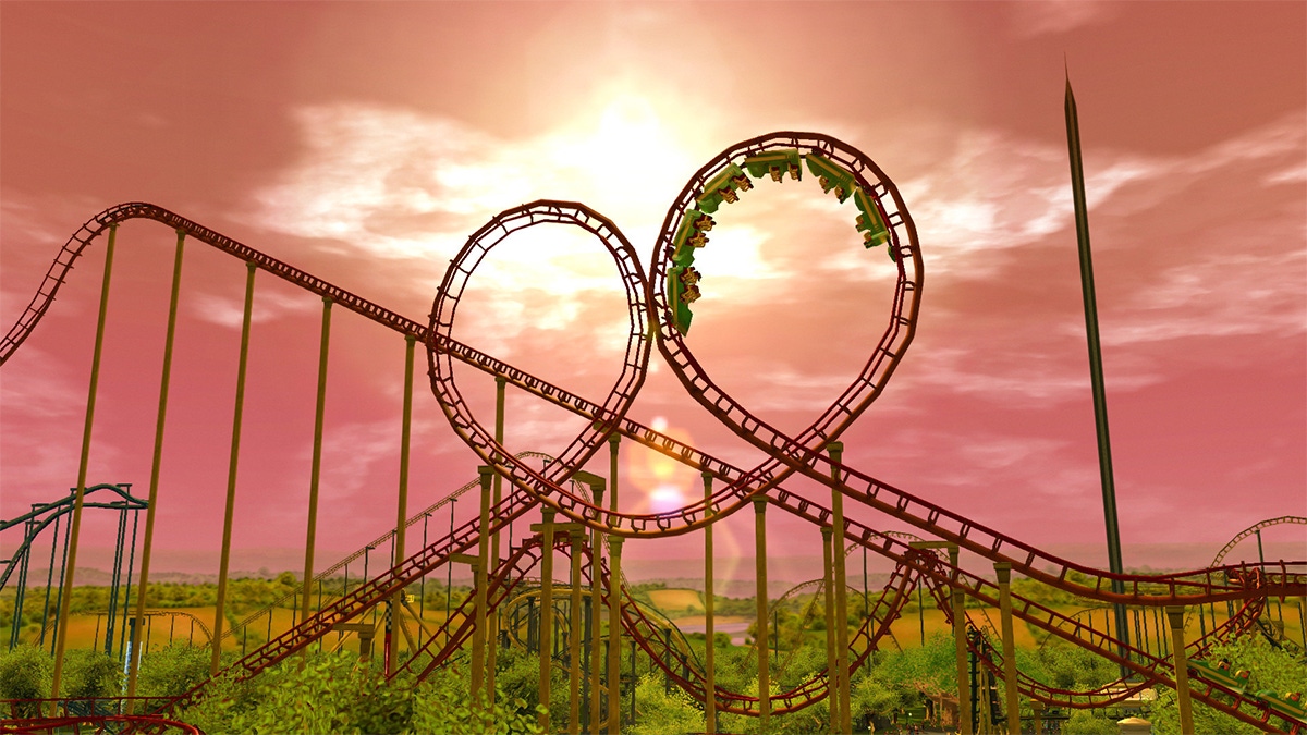 Happy customers being flung around in Rollercoaster Tycoon 3 Happy customers being flung around in Rollercoaster Tycoon 3