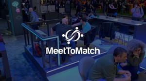 The MeetToMatch logo overlaid on a photograph from an in-person event The MeetToMatch logo overlaid on a photograph from an in-person event