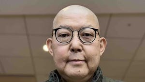 Headshot of the late graphics artist and business executive Thomas Lee. Headshot of the late graphics artist and business executive Thomas Lee.