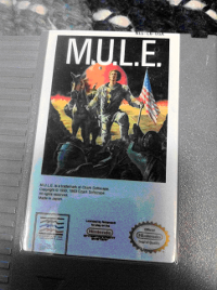 Phone photo of the NES cartridge for the video game M.U.L.E.