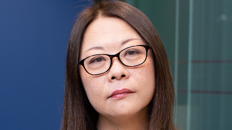 A photograph of Rieko Kodama. A photograph of Rieko Kodama.