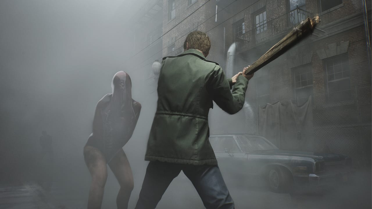 James Sunderland from the Silent Hill 2 fights an enemy James Sunderland from the Silent Hill 2 fights an enemy