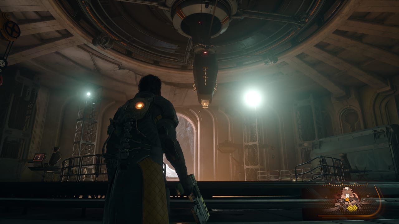 Player character Arjun talks to a mysterious coffin-shaped robot. Player character Arjun talks to a mysterious coffin-shaped robot.