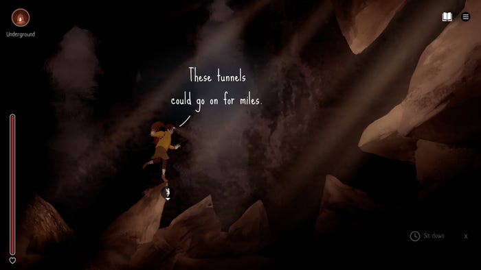 A teenage girl balances on sharp rocks in a dark cave