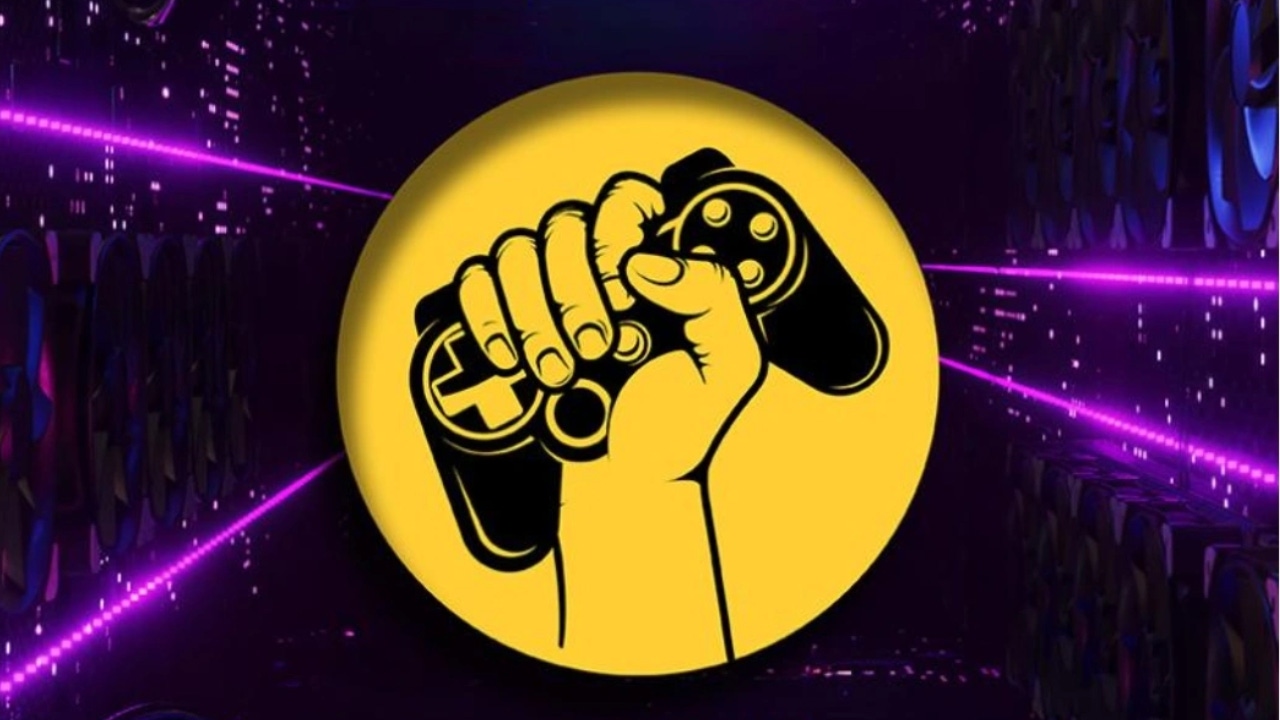 A logo of a raised fist holding a video game controller A logo of a raised fist holding a video game controller