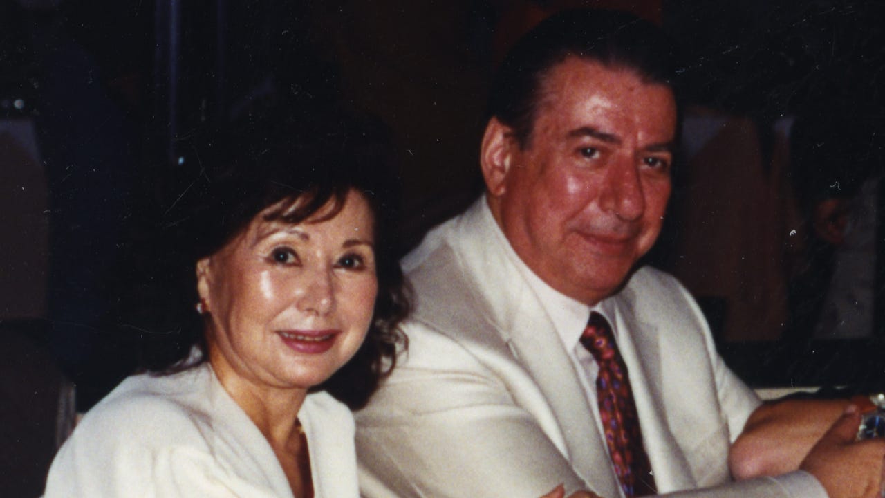 David And Masako Rosen smile for the camera. David And Masako Rosen smile for the camera.