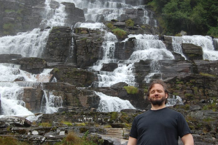A picture one of the developers enjoying a mountainside stream.