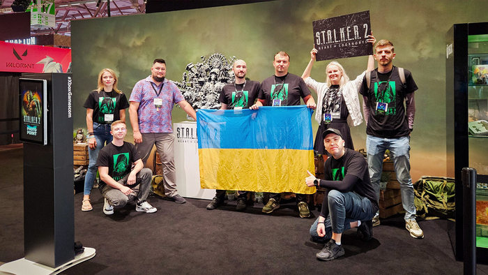Some members of the GSC team hold a Ukrainian flag Some members of the GSC team hold a Ukrainian flag