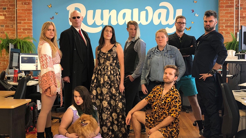 The team at Runaway gather in their favorite fashion-first outfits.