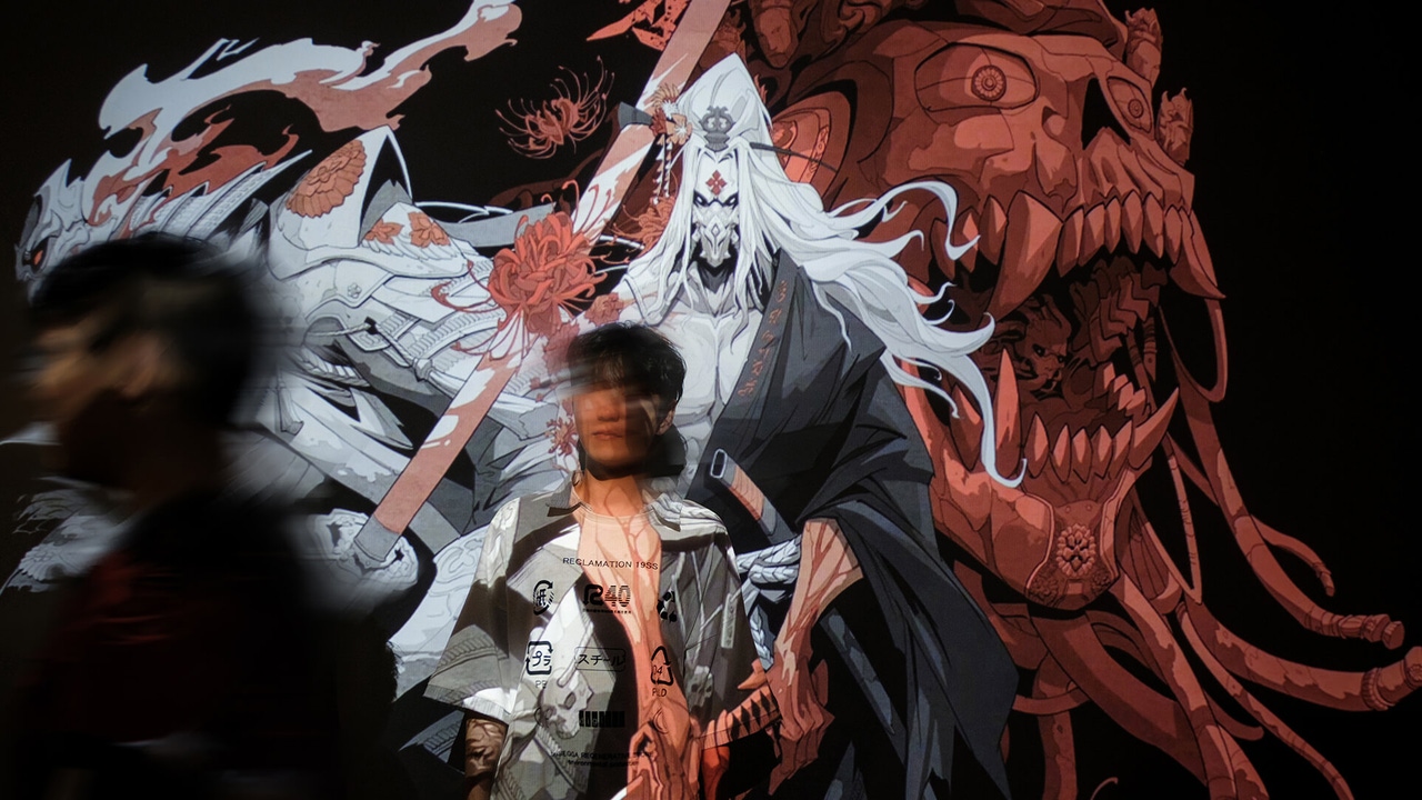 Photo of an employee from Imagendary Studios standing in front of a mural. Photo of an employee from Imagendary Studios standing in front of a mural.