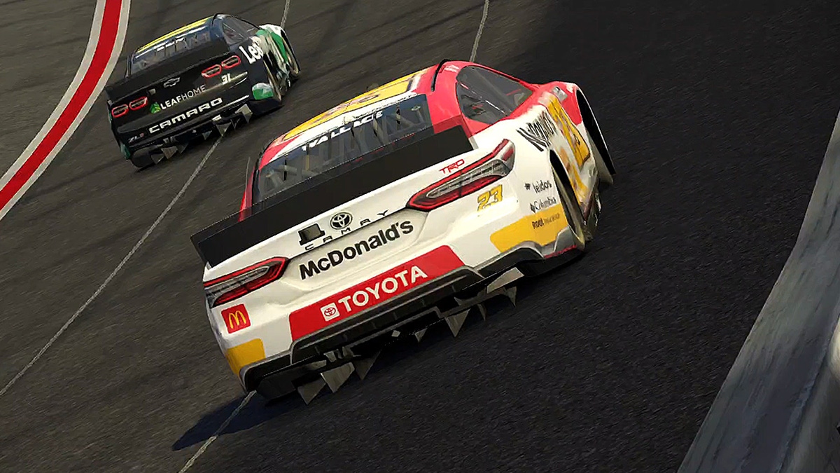 Two cars competing in Nascar Rivals Two cars competing in Nascar Rivals