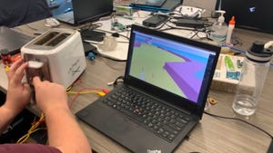 A toaster connected to a pc in order to play a golf game that launches a fish