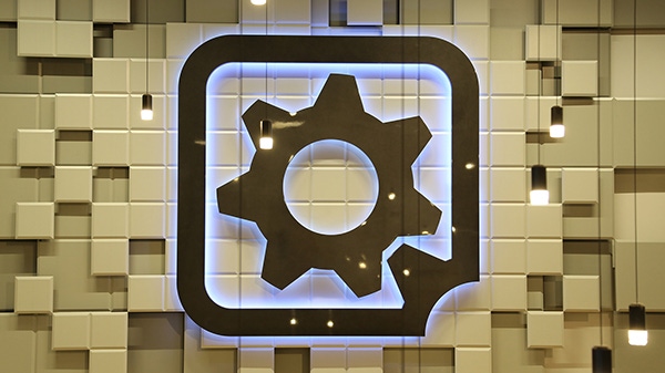 The logo of Gearbox software, hanging on a wall in the company offices.