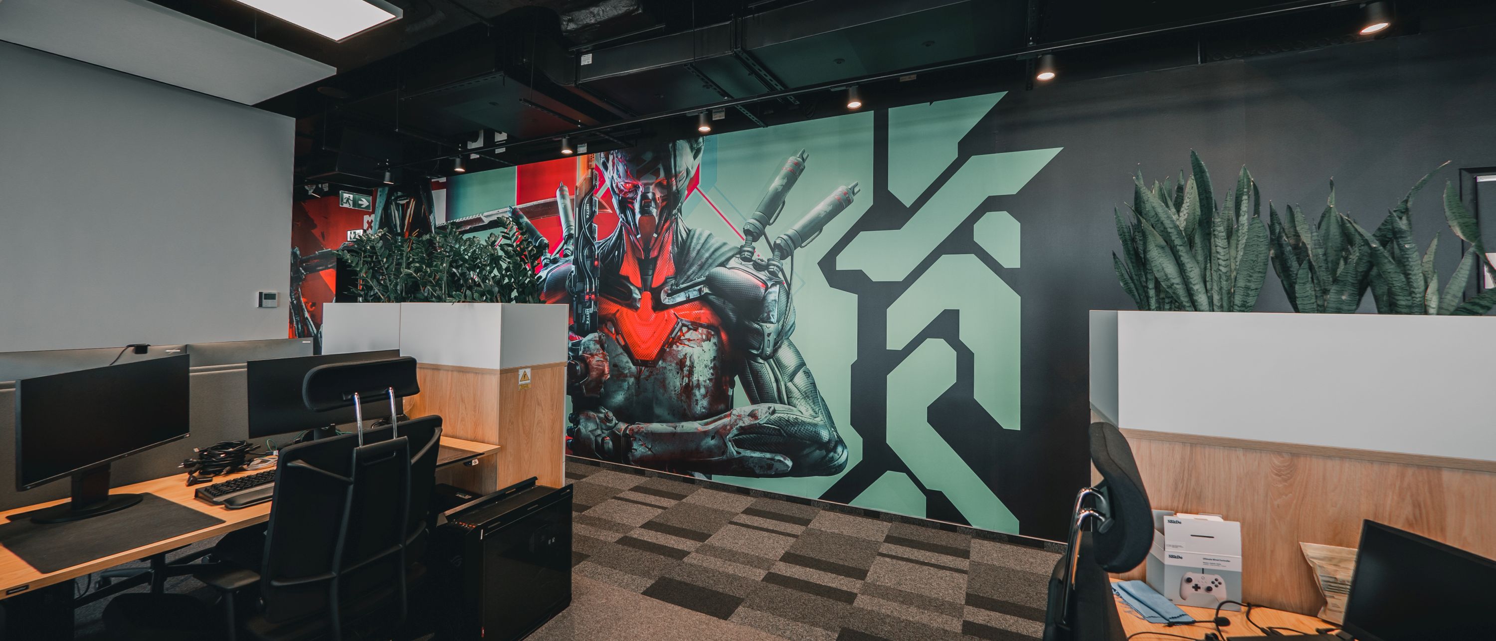 One More Level office with Ghostrunner key art