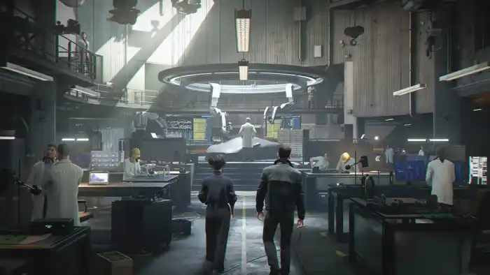 Bond and another agent walk into the technology lab Bond and another agent walk into the technology lab
