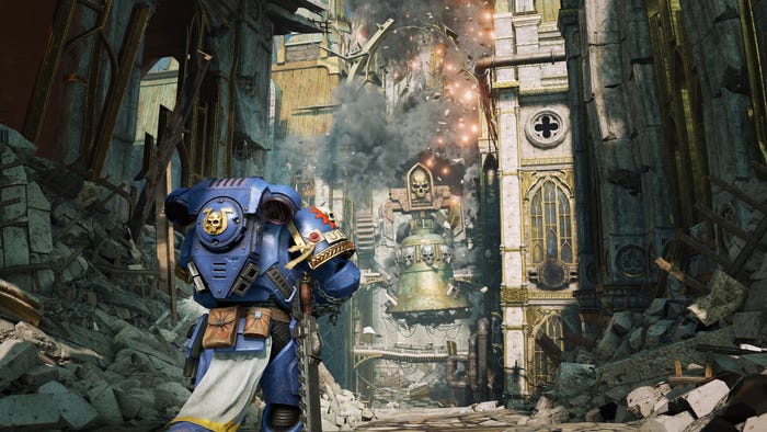 A screenshot from Space Marine 2. The player character walks toward an exploding building.
