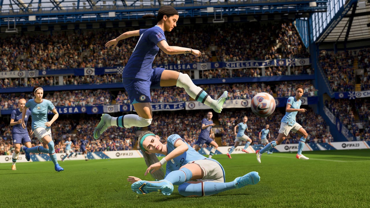 A screenshot of FIFA 23 showing a woman soccer player vaulting over a kick from the opposing team A screenshot of FIFA 23 showing a woman soccer player vaulting over a kick from the opposing team