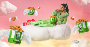 Liza Koshy sitting on a cloud, surrounded by KFC's new Beyond Meat Chicken
