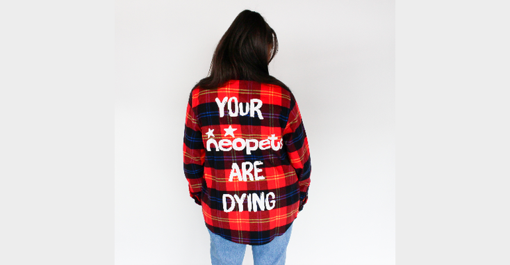 The flannel from the Cakeworthy and Neopets collection featuring the quote "Your Neopets are dying." The flannel from the Cakeworthy and Neopets collection featuring the quote "Your Neopets are dying."