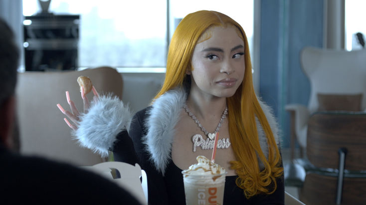 Ice Spice with her Dunkin drink.