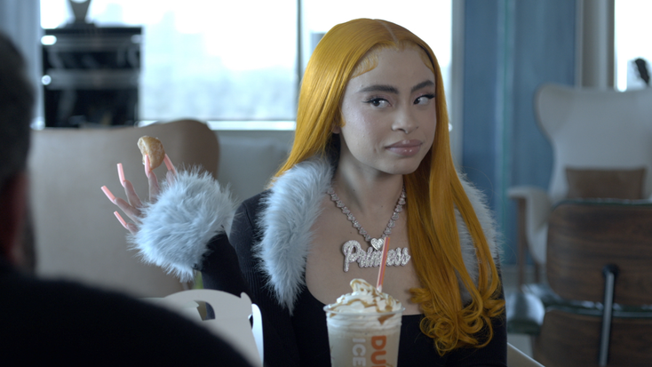 Ice Spice with her Dunkin drink. Ice Spice with her Dunkin drink.