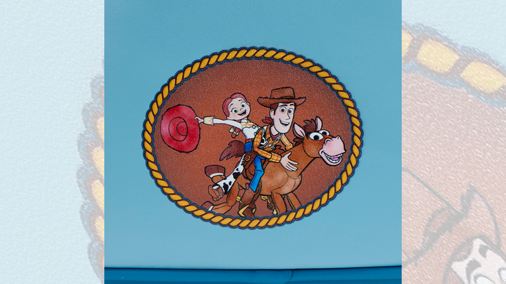 Patch on the “Toy Story” Woody’s Roundup Mini Backpack. Patch on the “Toy Story” Woody’s Roundup Mini Backpack.