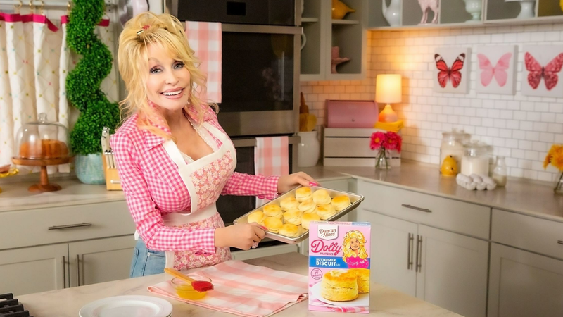 Dolly Parton baking her Duncan Hines’ Buttermilk Biscuit mix.Conagra Brands