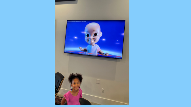 Olympia Ohanian in front of a showing of “Dance with Qai Qai.”   