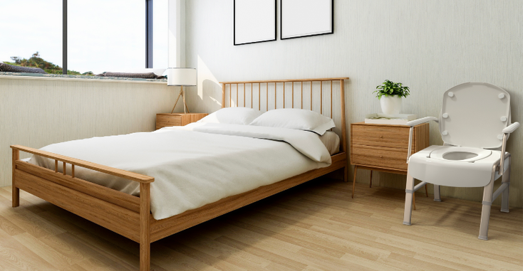 A mockup of what the 3-in-1 comfort commode would look like in a bedroom A mockup of what the 3-in-1 comfort commode would look like in a bedroom