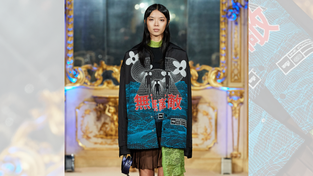 Model wearing the fall/winter 2023 Godzilla collection. 