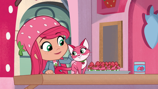 Strawberry Shortcake and her cat Custard.
