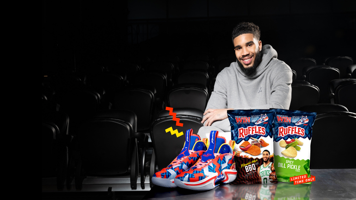 Jayson Tatum with his chip flavors and Air Jordan sneakers.