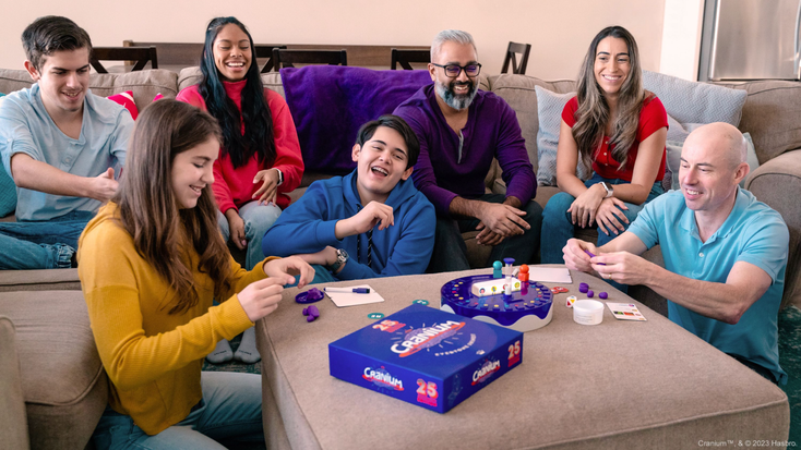 A family playing Cranium. A family playing Cranium.