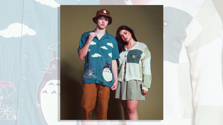 Models wearing clothing featuring “My Neighbor Totoro" characters.